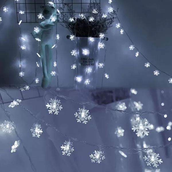 Dazzle Bright Christmas Snowflake String Lights 2 Pack Total 100LED 50FT Battery Operated Christmas Lights with 8 Lighting Modes for Indoor Outdoor Xmas Tree Party Decorations WhiteWhite