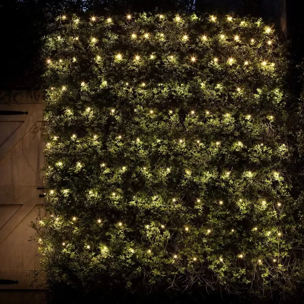 Dazzle Bright Christmas 200 LED Net Lights 98 FT x 66 FT Connectable Mesh Lights with 8 Lighting Modes Christmas Decorations for Indoor Outdoor Bush Yard Garden Decor Warm White Green WireWarm White