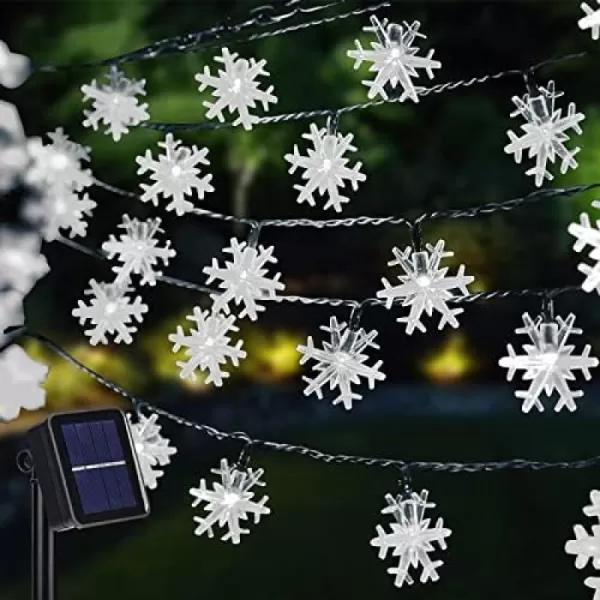 Dazzle Bright 100 LED Solar Christmas Snowflake Lights Outdoor 39 FT Solar Powered Snowflake String Lights Waterproof for Xmas Tree Holiday Wedding Party Patio Decorations Multi ColorWhite