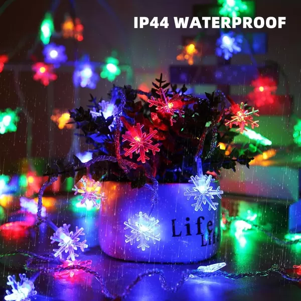 Dazzle Bright Christmas Snowflakes String Lights 100 LED 49FT Waterproof Christmas Lights Plug in with 8 Modes for Indoor Outdoor Holiday Wedding Party Xmas Tree Garden Decorations WhiteMulticolor
