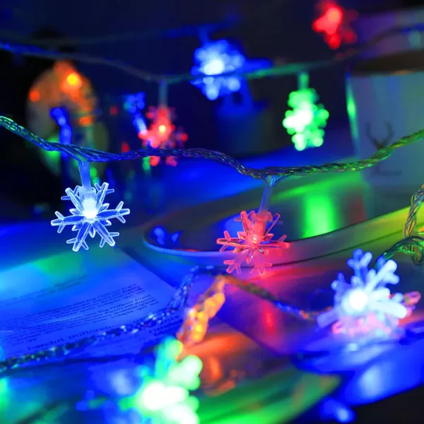 Dazzle Bright Christmas Snowflakes String Lights 100 LED 49FT Waterproof Christmas Lights Plug in with 8 Modes for Indoor Outdoor Holiday Wedding Party Xmas Tree Garden Decorations WhiteMulticolor