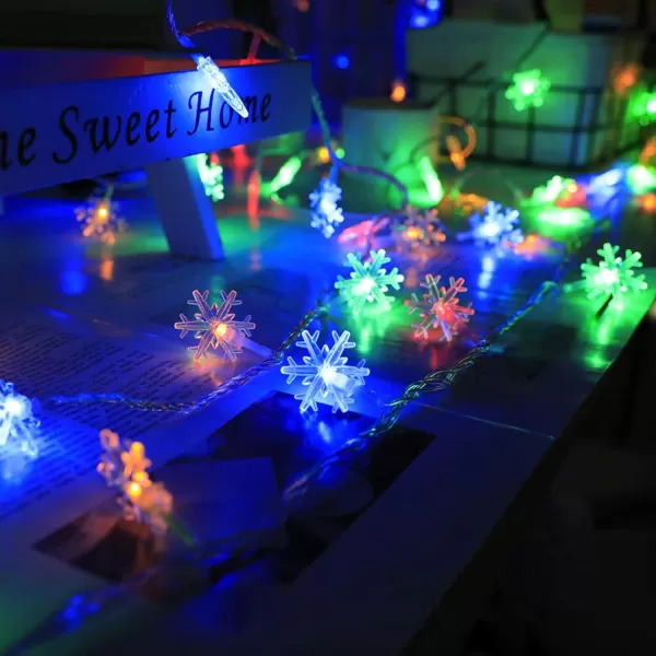 Dazzle Bright Christmas Snowflakes String Lights 100 LED 49FT Waterproof Christmas Lights Plug in with 8 Modes for Indoor Outdoor Holiday Wedding Party Xmas Tree Garden Decorations WhiteMulticolor