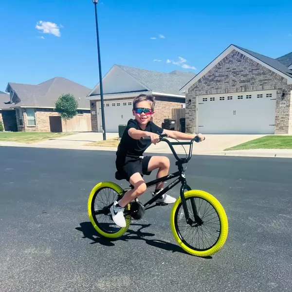imageJOYSTAR Brockway Freestyle Kids BMX Bikes 20quot 24quot Kids Bicycles for 614 Years Old Boys Girls and BeginnerLevel Riders 2 Pegs Multiple ColorsYellow