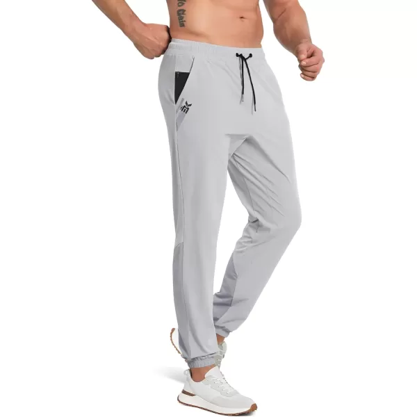 imageBROKIG Mens Contrast Athletic Running Sweatpants Lightweight Casual Gym Joggers Workout Pants with Zipper PocketsLight Gray