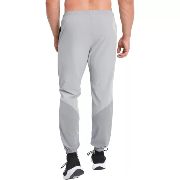 imageBROKIG Mens Contrast Athletic Running Sweatpants Lightweight Casual Gym Joggers Workout Pants with Zipper PocketsLight Gray