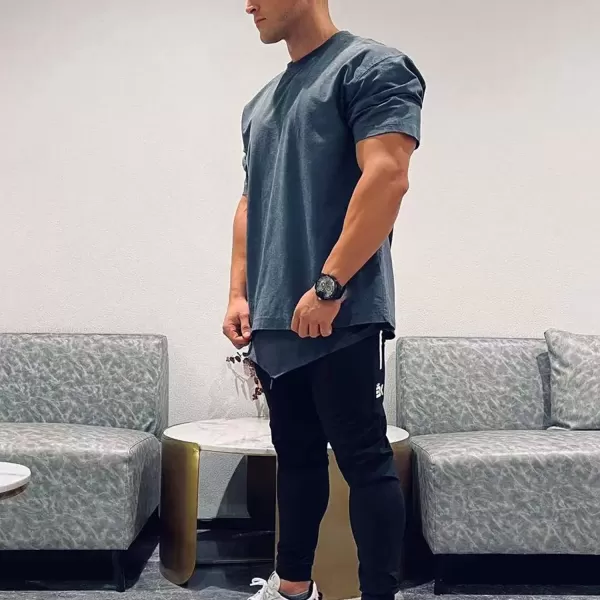 imageBROKIG Mens Lightweight Athletic Gym Jogger Pants Stretch Quick Dry Workout Running Sweat Pants with Zipper PocketsBlackdary Graylight Gray