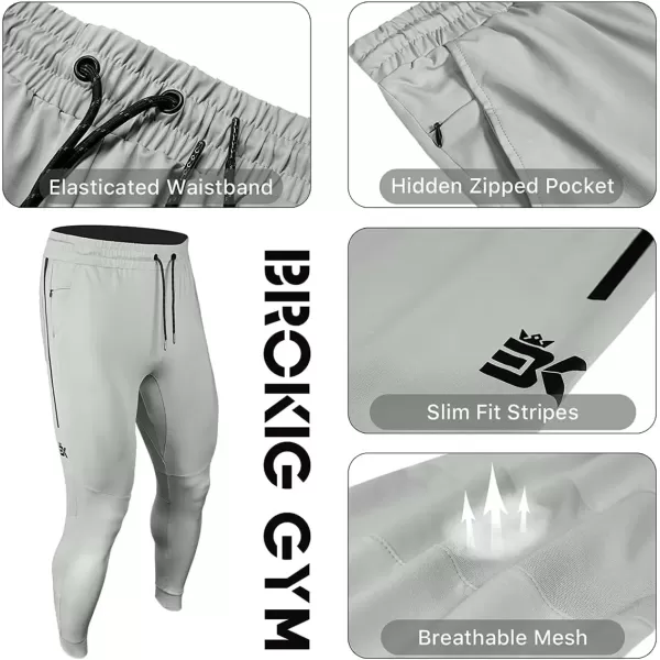 imageBROKIG Mens Lightweight Athletic Gym Jogger Pants Stretch Quick Dry Workout Running Sweat Pants with Zipper PocketsBlackdary Graylight Gray