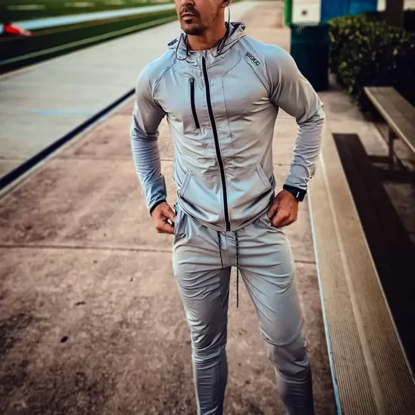 imageBROKIG Mens Lightweight Athletic Gym Jogger Pants Stretch Quick Dry Workout Running Sweat Pants with Zipper PocketsLight Gray