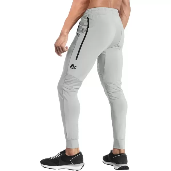 imageBROKIG Mens Lightweight Athletic Gym Jogger Pants Stretch Quick Dry Workout Running Sweat Pants with Zipper PocketsLight Gray