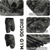 imageBROKIG Mens Thighs Mesh Gym Workout Shorts Bodybuilding Slim Athletic Running Shorts for Men with Zipper PocketsCamo Green
