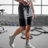 imageBROKIG Mens Linerless Athletic Shorts Quick Dry 8quot Lightweight Workout Running Shorts Men with Zipper PocketsLight Grey