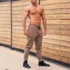 imageBROKIG Mens Slim Fit Workout Joggers Pants Casual Breathable Gym Training Tapered Sweatpants with Zipper PocketsZbeige