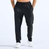 imageBROKIG Mens LightArmor Workout Sweatpants with Zip PocketStretch Gym Joggers Running Sweat Pants Athletic Pants for MenBlack