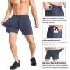 image:imageBROKIG Mens Lightweight Gym Shorts with Zip PocketStretch Fitted Quick Dry Athletic Shorts Men for Workout ExerciseBlackDark Grey
