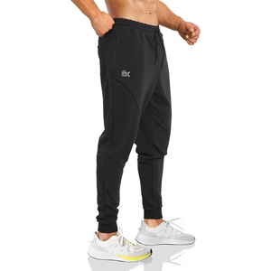 image:imageBROKIG Mens Workout Running Sweatpants Gym Jogger Pants Tapered Sweat Pants  Carrot Fit Ankle Cuffs Design Deep Zip PocketAthletic Sweat PantsCotton Polyester BlendElastic Waistband with DrawstringBlack