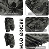 image:imageBROKIG Mens 7 Inch Slim Fit Gym Workout Shorts Tapered Running Shorts  Fitted Hidden Zipper Pocket Duable Knee Long Athletic Jogger Shorts for Squat Weightlifting Training Lounging Casual WearCamo Green