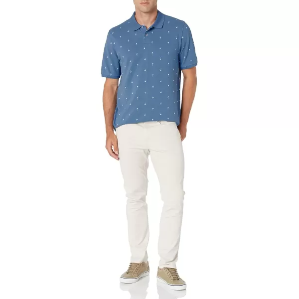 Amazon Essentials Mens RegularFit Cotton Pique Polo Shirt Available in Big amp TallBlueWhite Palm Leaf Print