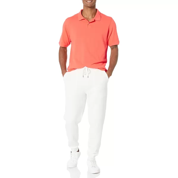 Amazon Essentials Mens RegularFit Cotton Pique Polo Shirt Available in Big amp TallCoral Orange