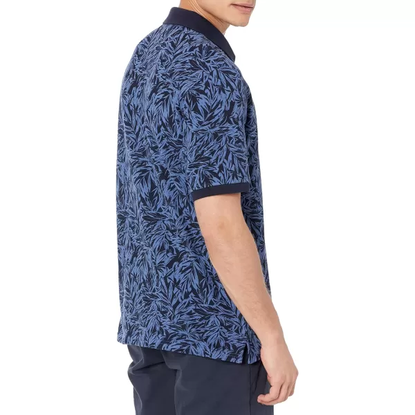 Amazon Essentials Mens RegularFit Cotton Pique Polo Shirt Available in Big amp TallIndigo Palm Leaf Print