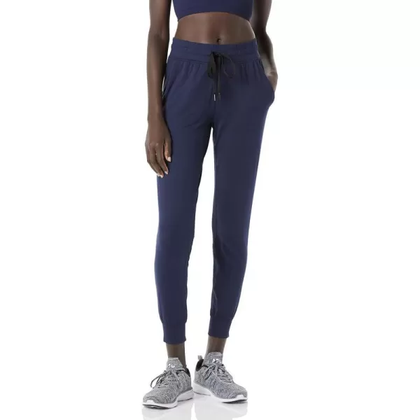 Amazon Essentials Womens Brushed Tech Stretch Jogger Pant Available in Plus SizeNavy