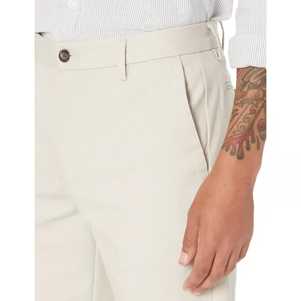 Amazon Essentials Mens ClassicFit WrinkleResistant FlatFront Chino Pant Available in Big  TallStone