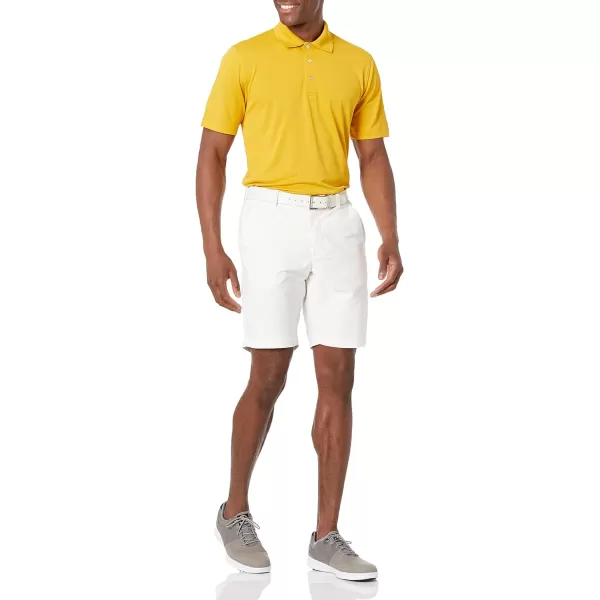 Amazon Essentials Mens RegularFit QuickDry Golf Polo Shirt Available in Big amp TallPolyester Golden Yellow