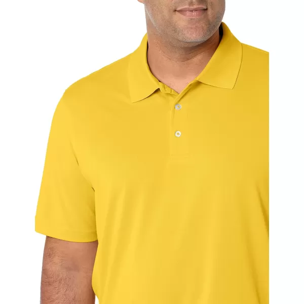 Amazon Essentials Mens RegularFit QuickDry Golf Polo Shirt Available in Big amp TallPolyester Golden Yellow