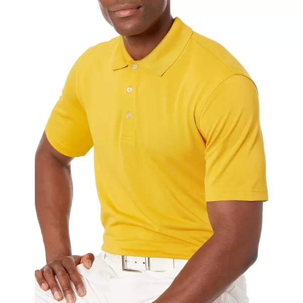 Amazon Essentials Mens RegularFit QuickDry Golf Polo Shirt Available in Big amp TallPolyester Golden Yellow