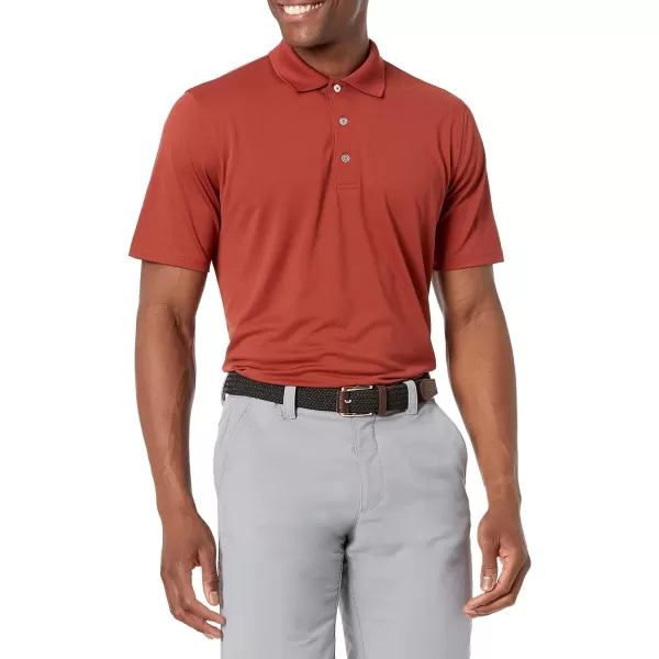 Amazon Essentials Mens RegularFit QuickDry Golf Polo Shirt Available in Big amp TallPolyester Rust