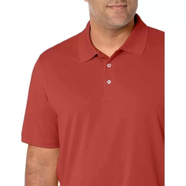 Amazon Essentials Mens RegularFit QuickDry Golf Polo Shirt Available in Big amp TallPolyester Rust