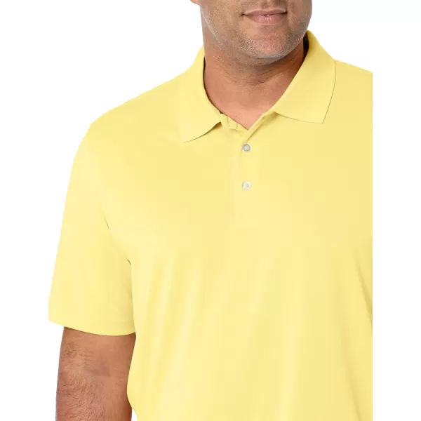 Amazon Essentials Mens RegularFit QuickDry Golf Polo Shirt Available in Big amp TallPolyester Yellow