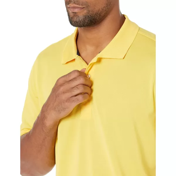 Amazon Essentials Mens RegularFit QuickDry Golf Polo Shirt Available in Big amp TallPolyester Yellow