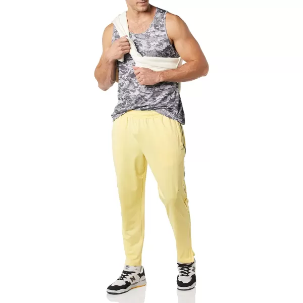Amazon Essentials Mens Performance Stretch Knit Training PantPineapple Yellow
