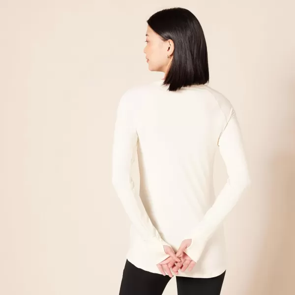 Amazon Essentials Womens Brushed Tech Stretch LongSleeve Crewneck Shirt Available in Plus SizeIvory