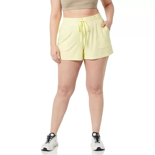 Amazon Essentials Womens Brushed Tech Stretch Short Available in Plus SizeLight Yellow