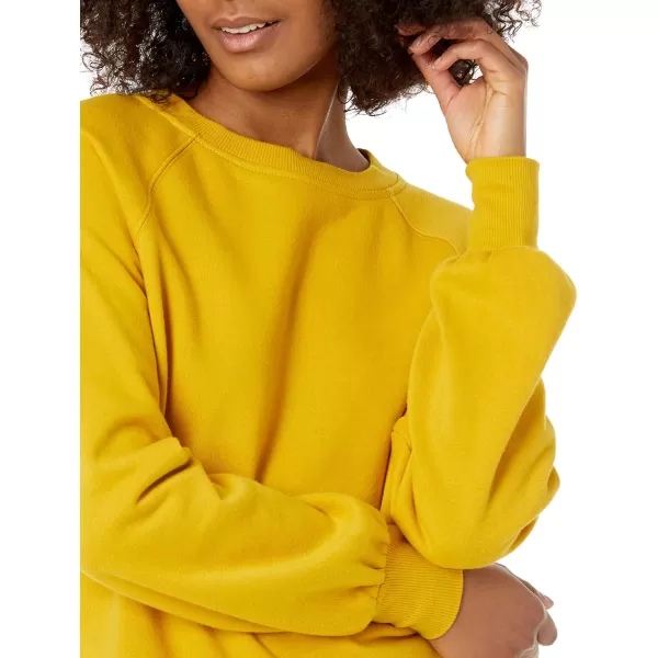 Amazon Essentials Womens ClassicFit Gathered LongSleeve Crewneck SweatshirtDark Yellow