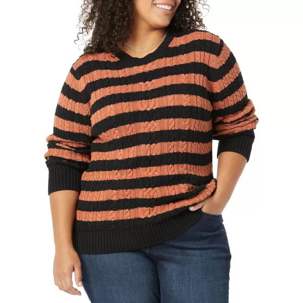 Amazon Essentials Womens Fisherman Cable LongSleeve Crewneck Sweater Available in Plus SizeBlackCaramel Stripe