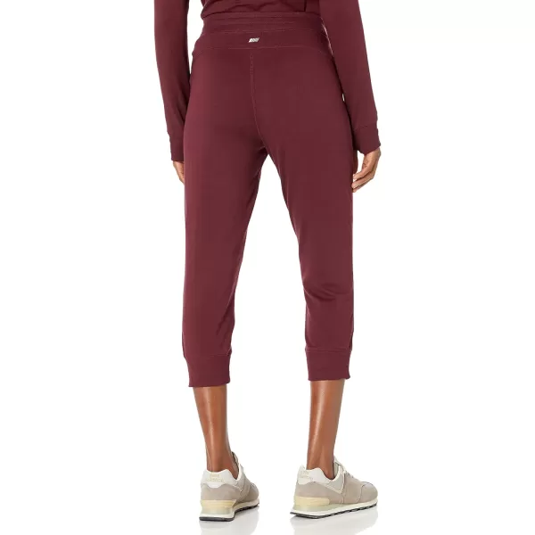 Amazon Essentials Womens RelaxedFit Studio Terry Capri Jogger PantDark Burgundy