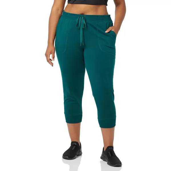 Amazon Essentials Womens RelaxedFit Studio Terry Capri Jogger PantDark Green