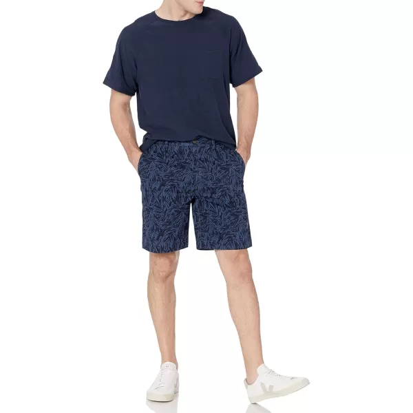 imageAmazon Essentials Mens ClassicFit 9quot Chino ShortIndigo Palm Leaf Print