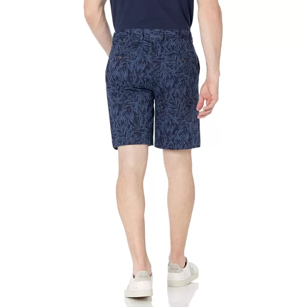 imageAmazon Essentials Mens ClassicFit 9quot Chino ShortIndigo Palm Leaf Print
