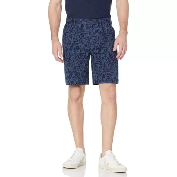imageAmazon Essentials Mens ClassicFit 9quot Chino ShortIndigo Palm Leaf Print