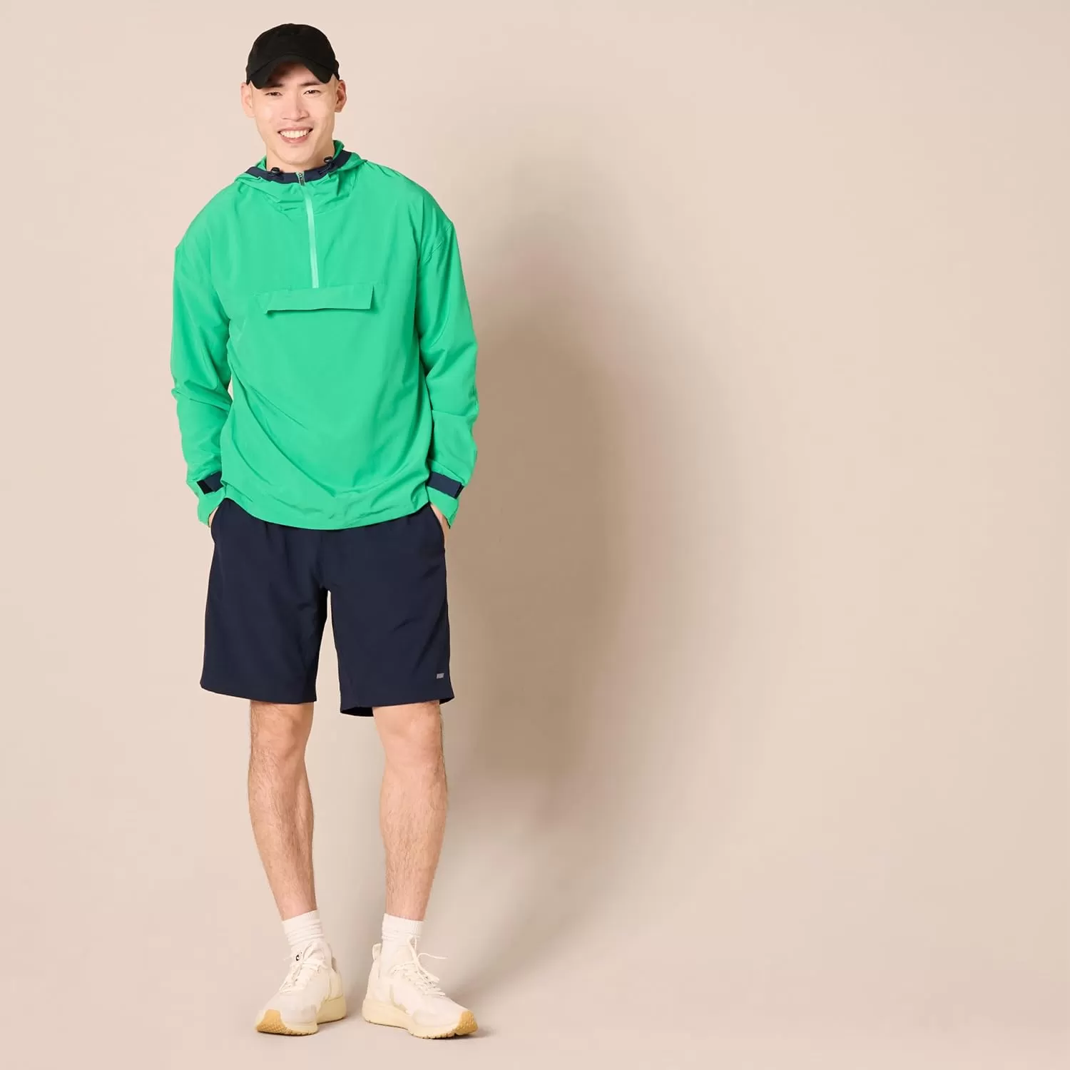 imageAmazon Essentials Mens Stretch Woven Quarter Zip Hooded Colorblock JacketGreen