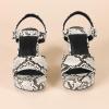 imageAmazon Essentials Womens Platform Heel SandalFaux Snake