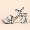 imageAmazon Essentials Womens Platform Heel SandalFaux Snake