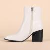 imageAmazon Essentials Womens Clean Heel Ankle BootIvory