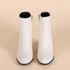 imageAmazon Essentials Womens Clean Heel Ankle BootIvory