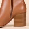 imageAmazon Essentials Womens Clean Heel Ankle BootTan