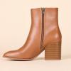 imageAmazon Essentials Womens Clean Heel Ankle BootTan