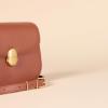 imageAmazon Essentials Flap BagTan